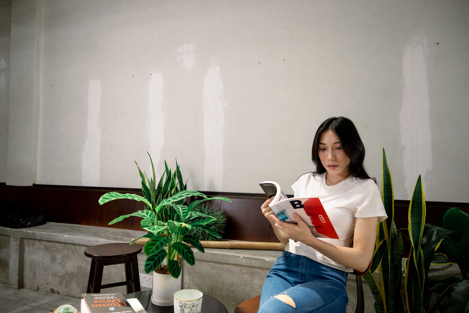 Newsletter Banner of woman in Kualesa Solid Baby Tee White